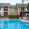 a pool in front of a building
