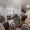 a dining room and kitchen and living room
