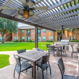 Relax and make memories at Stone Brook!  a covered deck with seating
