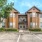 front of a building with a parking lot