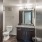 a bathroom with a sink a mirror and a toilet