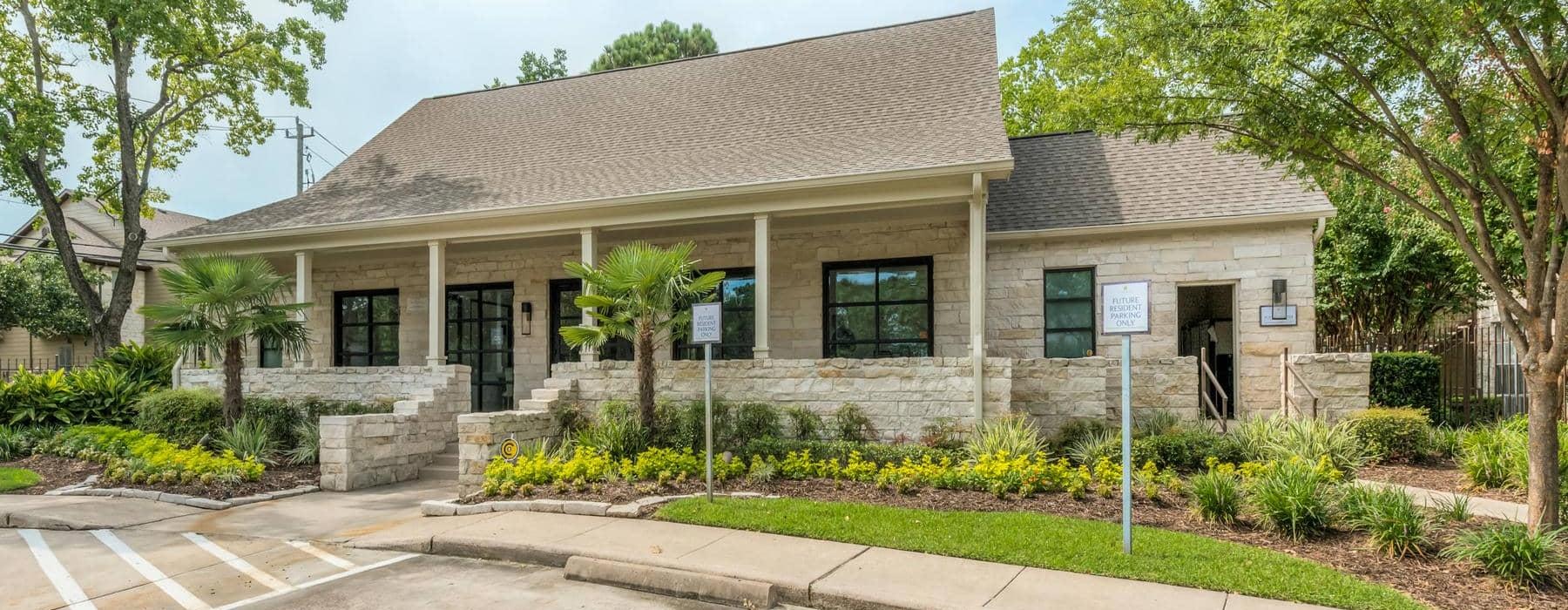 Find your perfect fit at Stone Brook front of a building with a yard and parking